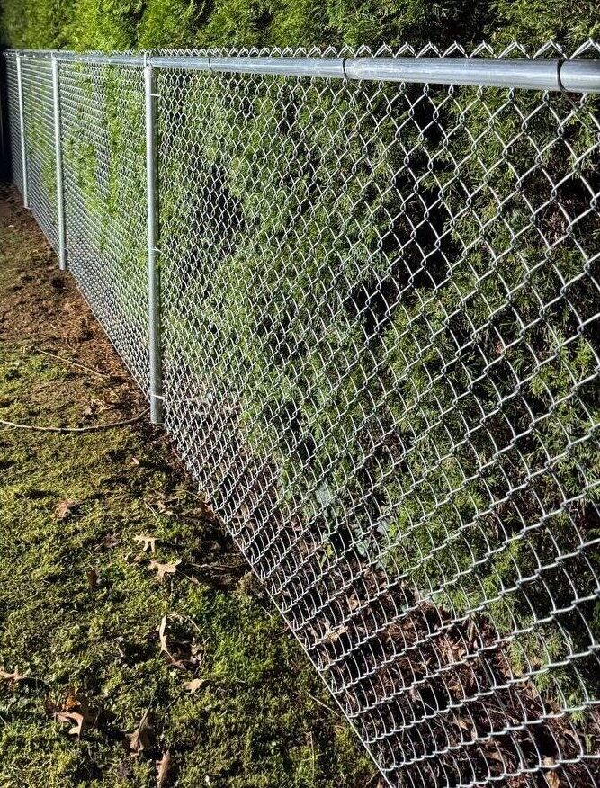 Galvanized chain link fence installation in Bellevue yard