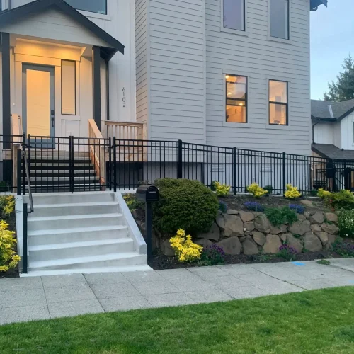 Ornamental steel fence installation in Seattle